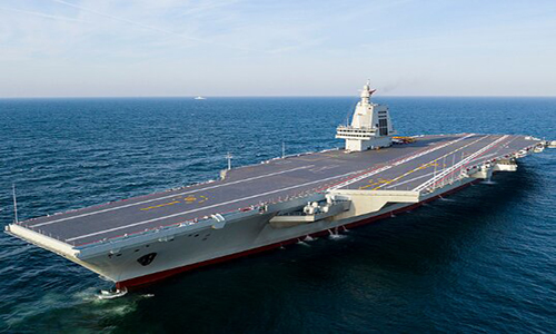 国防部回应福建舰通过台湾海峡：中国航母建设按需推进